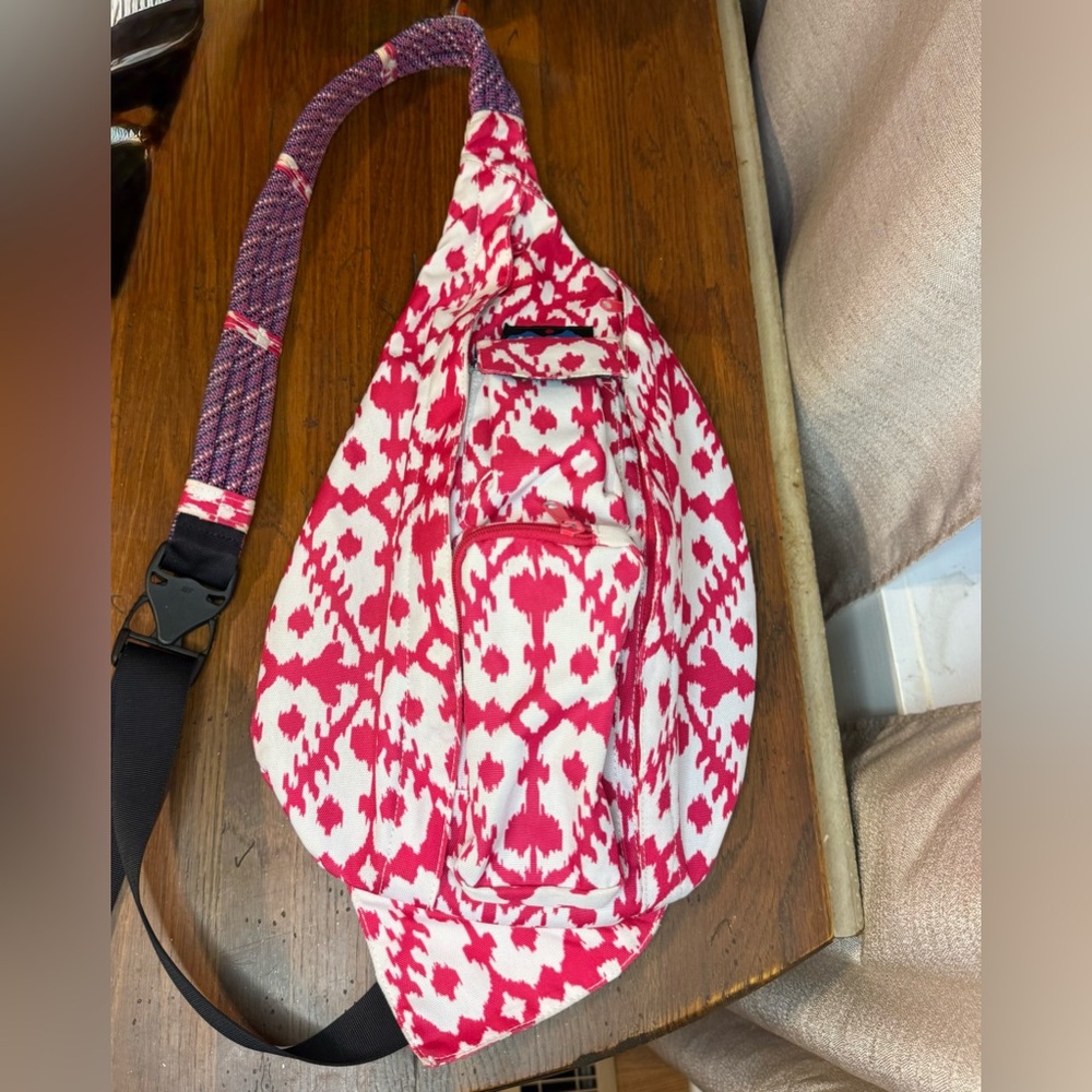 KAVU Rope Sling bag in the Hot Blot pattern, made from 100% polyester.  EUC